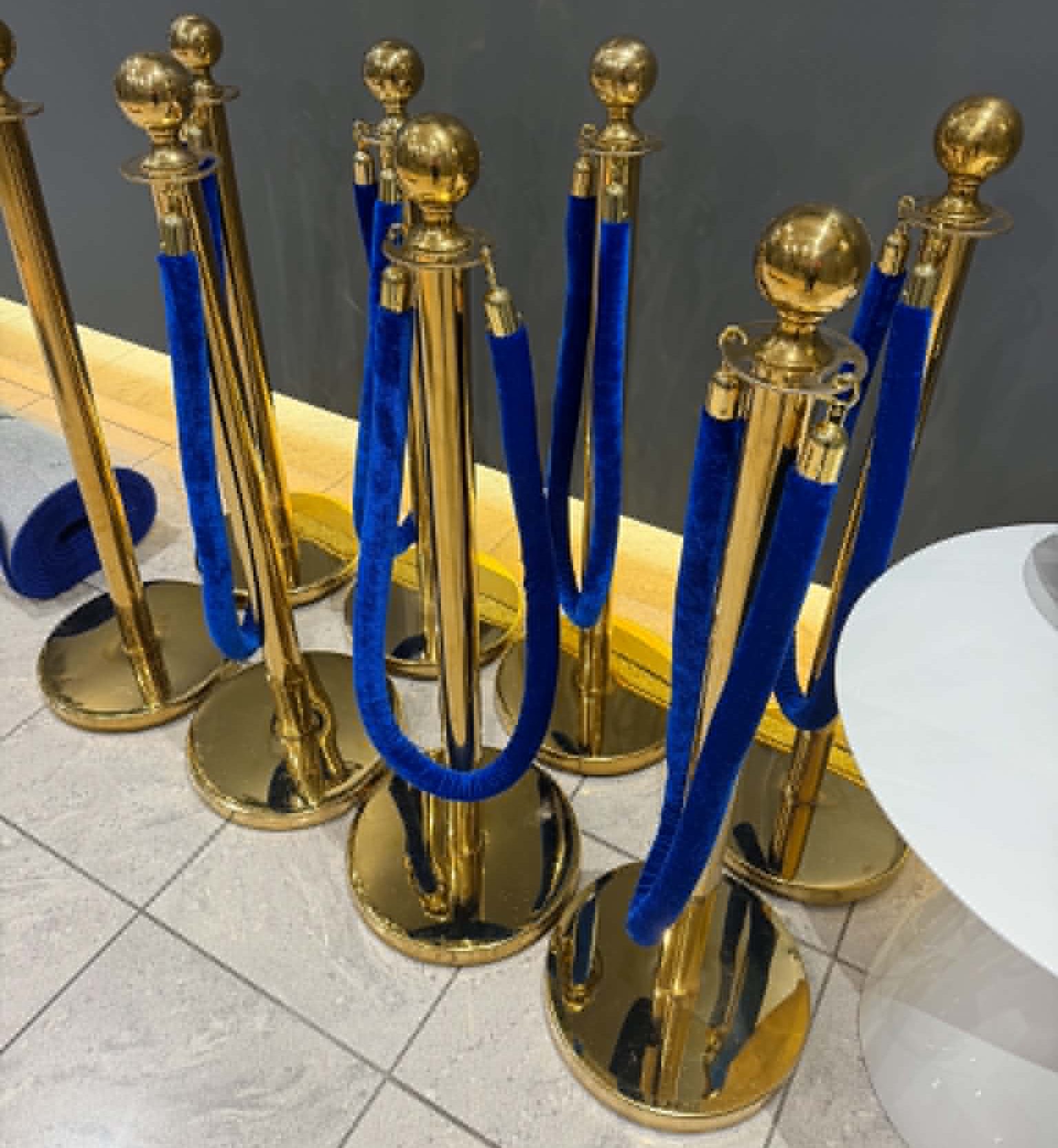 Hire Gold Event Bollards with Royal Blue Rope